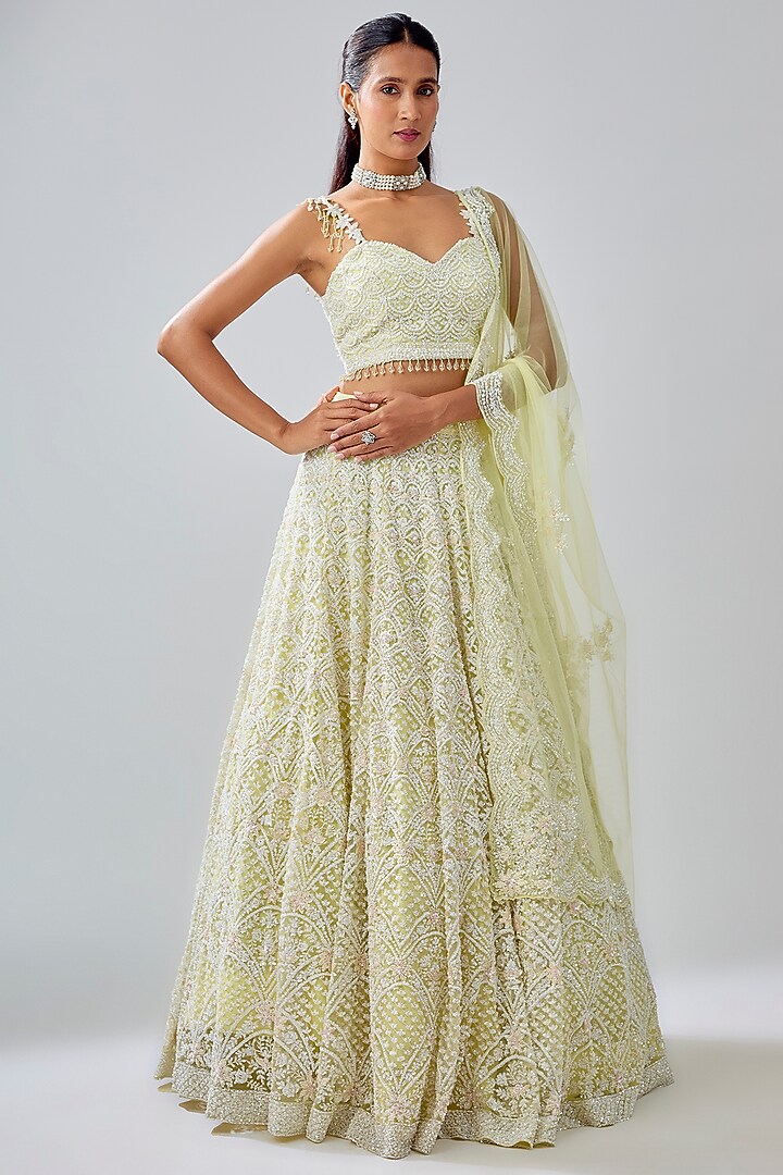 Yellow Net Sequin & Cutdana Embroidered Bridal lehenga for 22 Lehenga Set by Kalighata at Pernia's Pop Up Shop