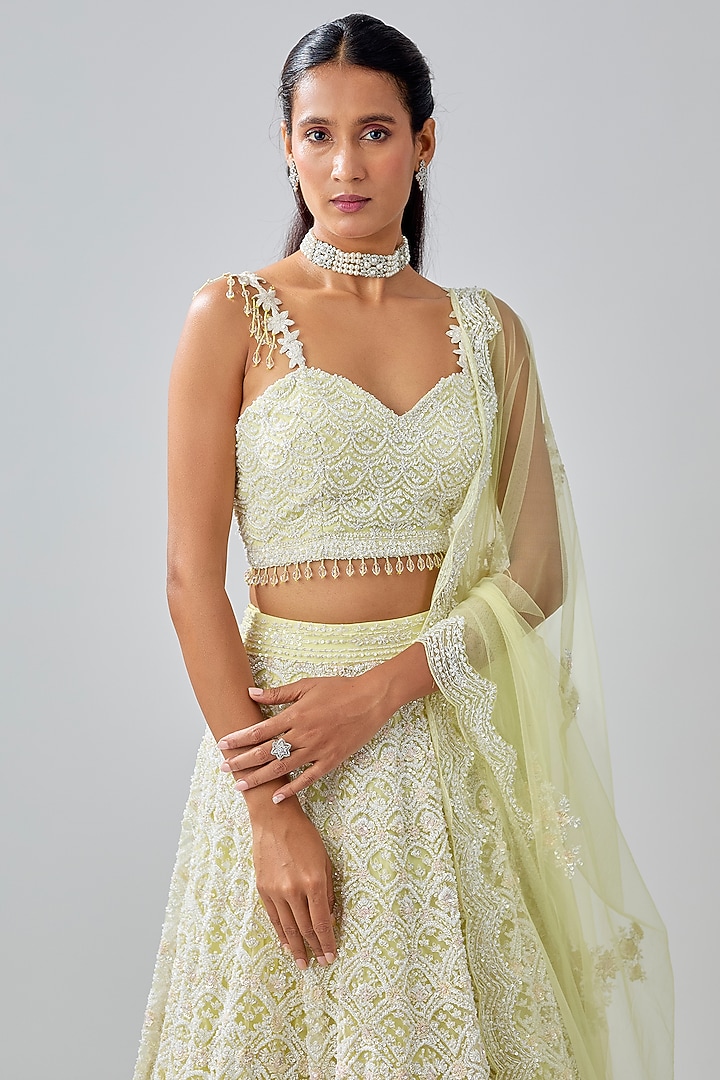 Yellow Net Sequin & Cutdana Embroidered Bridal Lehenga Set by Kalighata at Pernia's Pop Up Shop