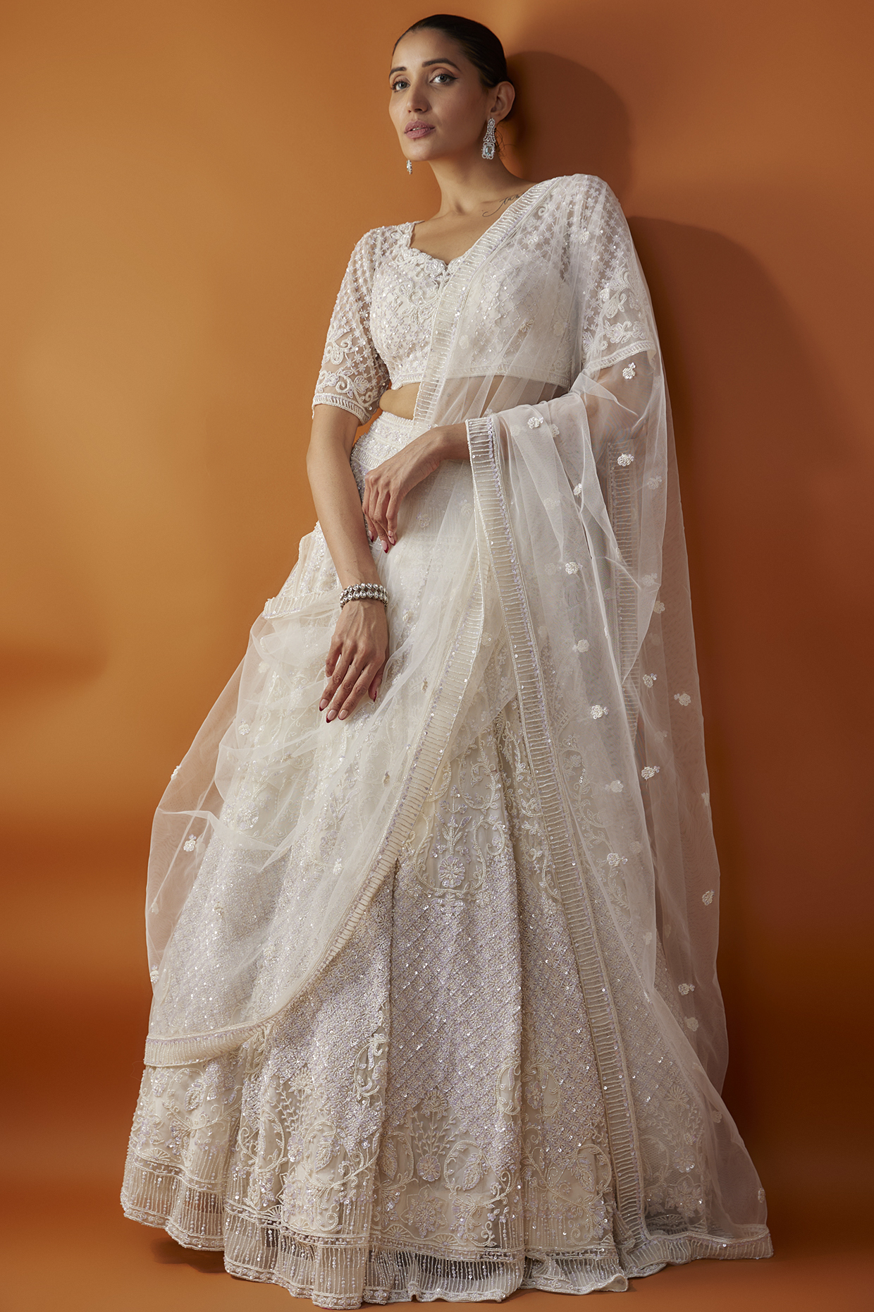 Blush Pink Net Boota Hand Embroidered Bridal Lehenga Set by Kalighata at Pernia's Pop Up Shop