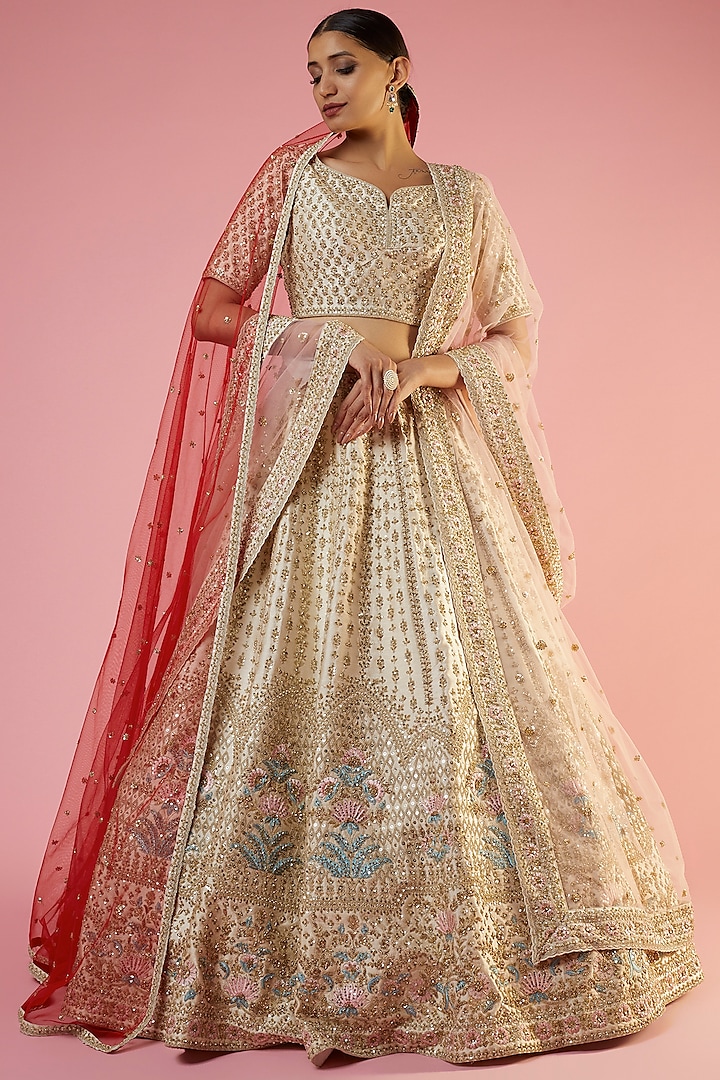 Peach Raw Silk Embroidered Lehenga Set by Kalighata