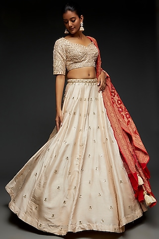 Ivory Silk Hand Embroidered Lehenga Set by Kalighata
