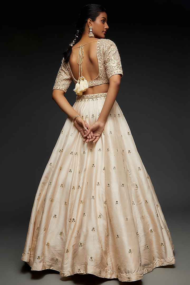 Ivory Silk Hand Embroidered Wedding Lehenga Set by Kalighata at Pernia's Pop Up Shop
