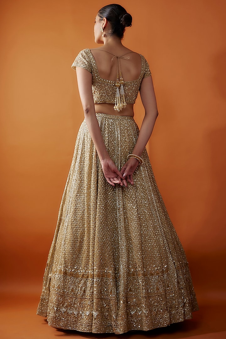 Gold Organza Cutdana & Sequins Hand Embroidered Bridal Lehenga Set by Kalighata at Pernia's Pop Up Shop