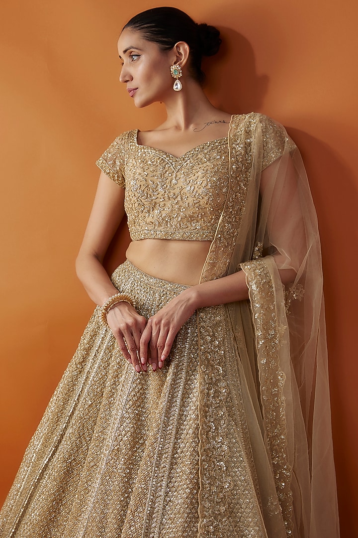 Gold Organza Cutdana & Sequins Hand Embroidered Bridal Lehenga Set by Kalighata at Pernia's Pop Up Shop