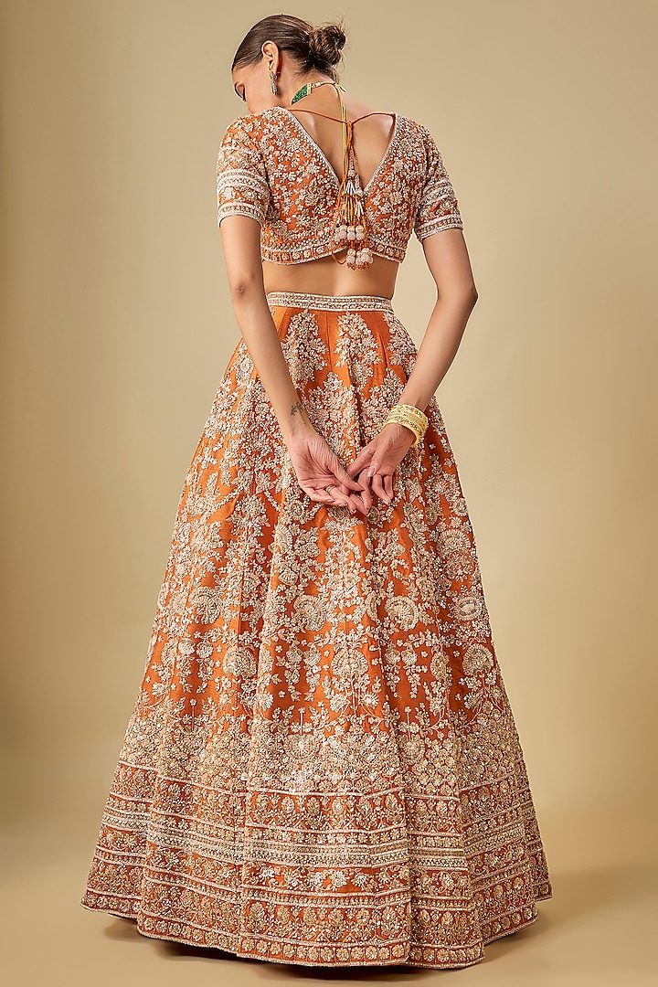 Rust Raw Silk Hand & Machine Embroidered Bridal Lehenga Set by Kalighata at Pernia's Pop Up Shop