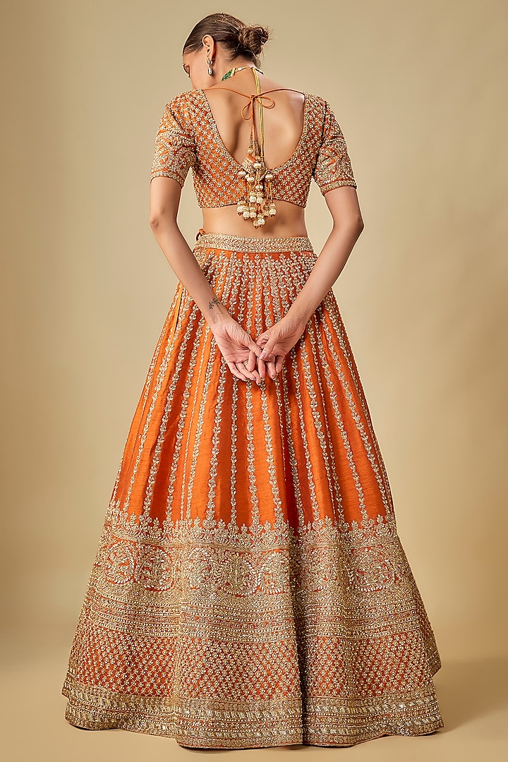 Rust Raw Silk Hand & Machine Embroidered Bridal Lehenga Set by Kalighata at Pernia's Pop Up Shop