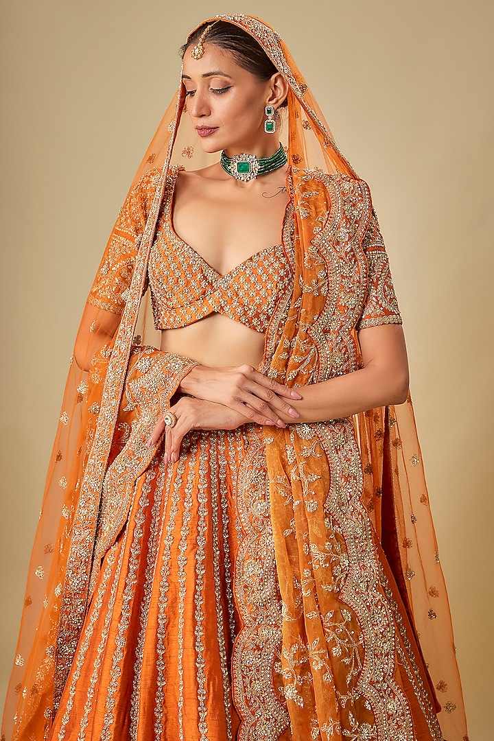 Rust Raw Silk Hand & Machine Embroidered Bridal Lehenga Set by Kalighata at Pernia's Pop Up Shop