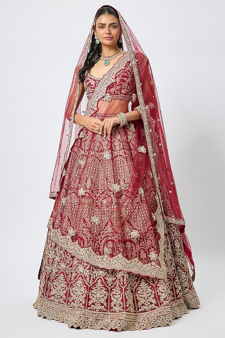 Maroon Raw Silk Cutdana Hand & Machine Embroidered Bridal Lehenga Set by Kalighata at Pernia's Pop Up Shop