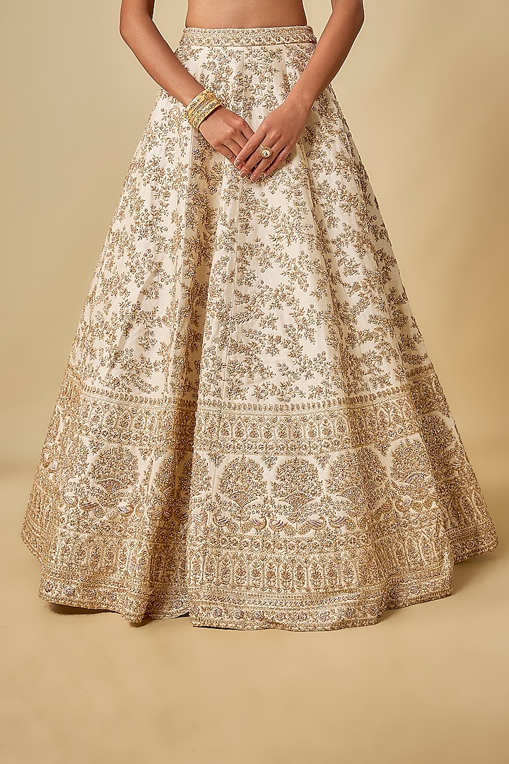 Ivory Raw Silk Hand & Machine Embroidered Bridal Lehenga Set by Kalighata at Pernia's Pop Up Shop