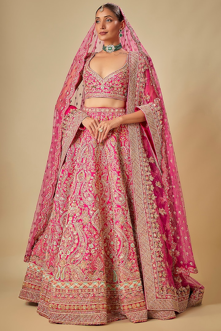 Rani Pink Raw Silk Hand & Machine Embroidered Bridal Lehenga Set by Kalighata at Pernia's Pop Up Shop