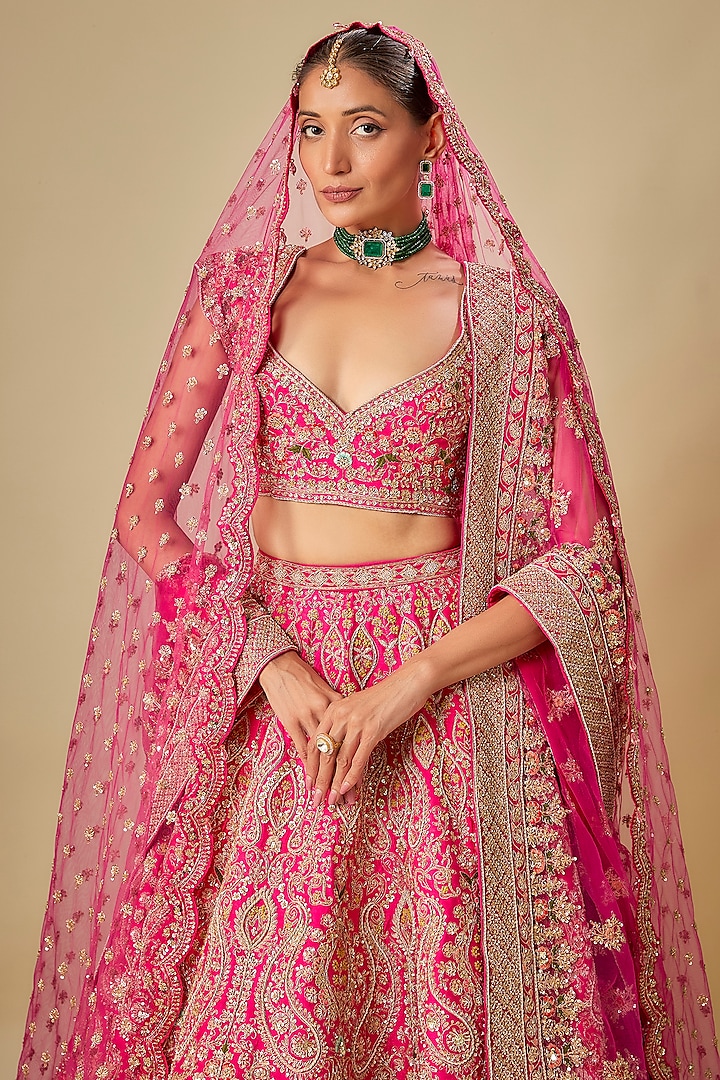 Rani Pink Raw Silk Hand & Machine Embroidered Bridal Lehenga Set by Kalighata at Pernia's Pop Up Shop