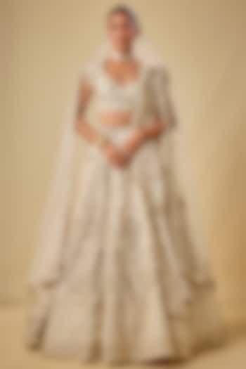 Ivory Raw Silk Hand & Machine Embroidered Bridal Lehenga Set by Kalighata at Pernia's Pop Up Shop