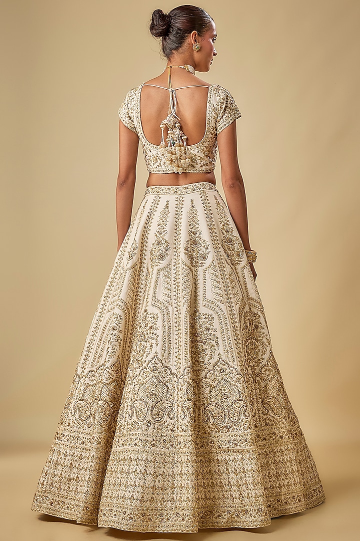 Ivory Raw Silk Hand & Machine Embroidered Bridal Lehenga Set by Kalighata at Pernia's Pop Up Shop
