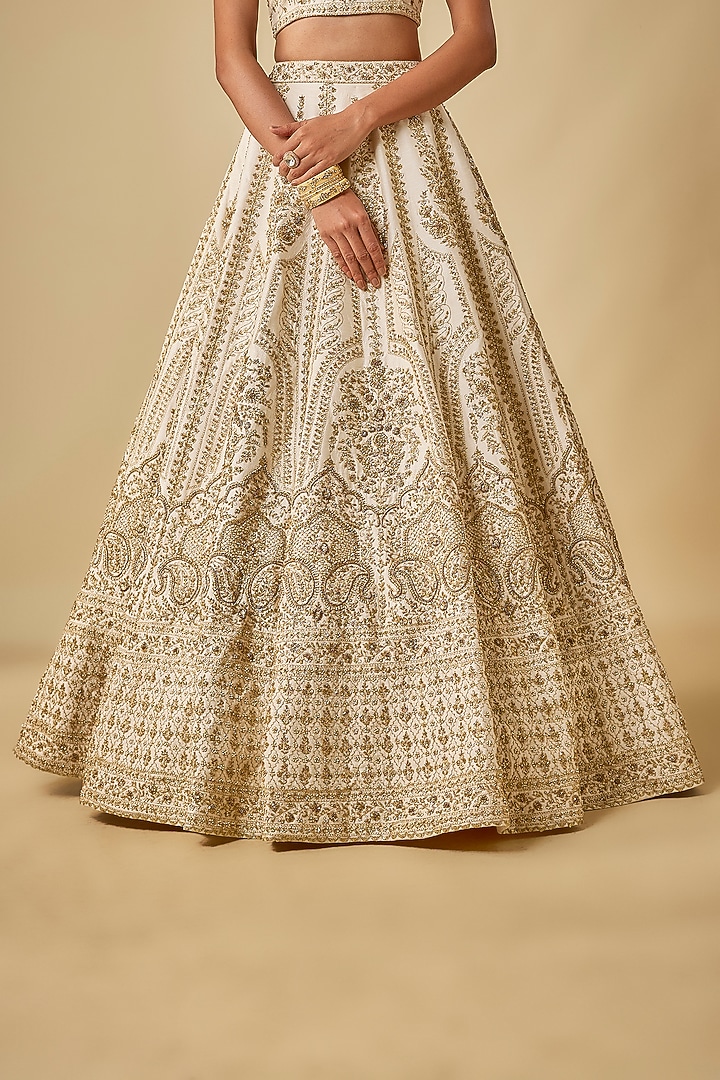 Ivory Raw Silk Hand & Machine Embroidered Bridal Lehenga Set by Kalighata at Pernia's Pop Up Shop