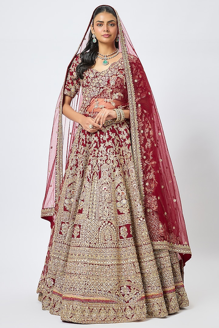 Maroon Raw Silk Cutdana Hand & Machine Embroidered Bridal Lehenga Set by Kalighata at Pernia's Pop Up Shop