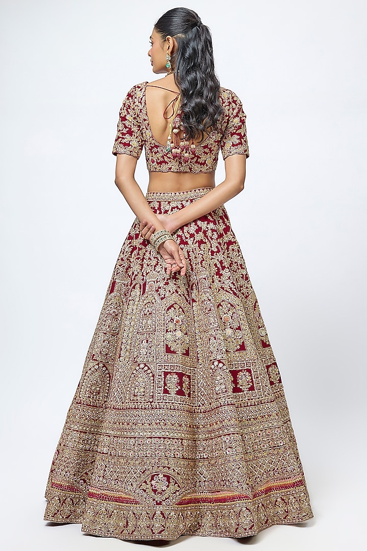Maroon Raw Silk Cutdana Hand & Machine Embroidered Bridal Lehenga Set by Kalighata at Pernia's Pop Up Shop