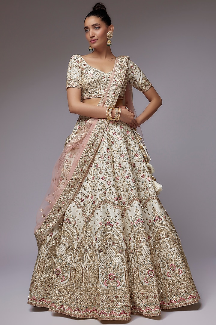 Ivory Raw Silk Hand Embroidered Lehenga Set by Kalighata at Pernia's Pop Up Shop