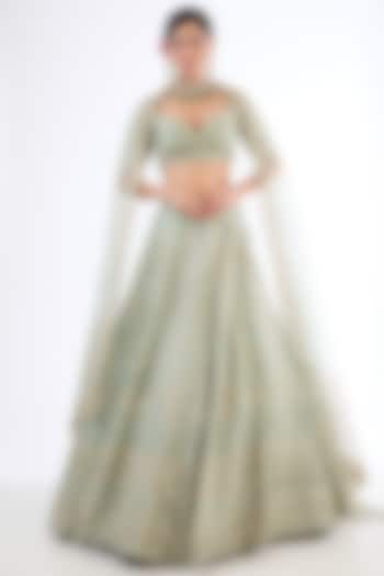 Dusty Firoza Raw Silk Zardosi Machine Embroidered Bridal Lehenga Set by Kalighata at Pernia's Pop Up Shop