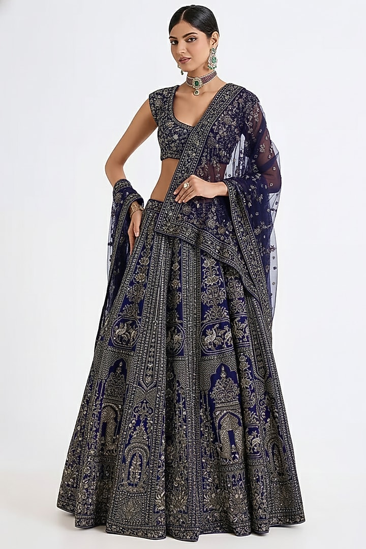 Navy Raw Silk Hand & Machine Embroidered Bridal Lehenga Set by Kalighata at Pernia's Pop Up Shop