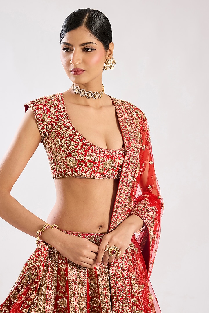 Red Raw Silk Zari Hand & Machine Embroidered Bridal Lehenga Set by Kalighata at Pernia's Pop Up Shop