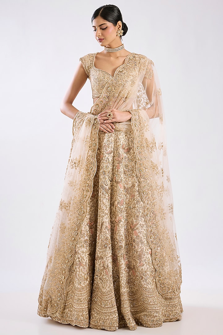 Peach Raw Silk Zari Hand & Machine Embroidered Bridal Lehenga Set by Kalighata at Pernia's Pop Up Shop