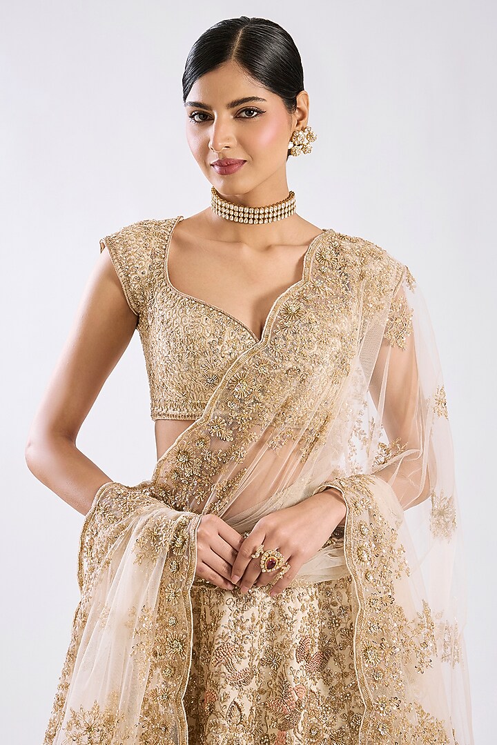 Peach Raw Silk Zari Hand & Machine Embroidered Bridal Lehenga Set by Kalighata at Pernia's Pop Up Shop
