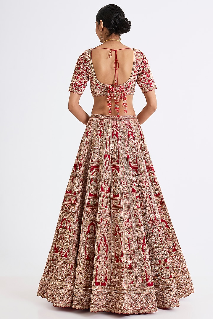 Red Raw Silk Zari Hand & Machine Embroidered Bridal Lehenga Set by Kalighata at Pernia's Pop Up Shop