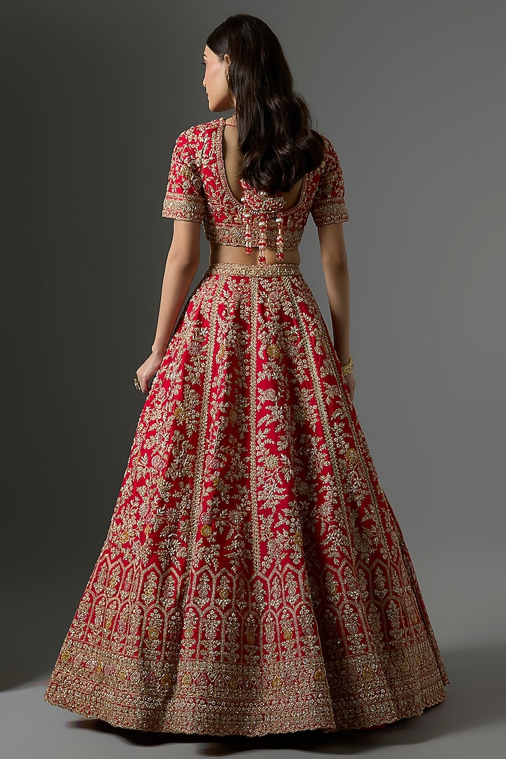 Red Raw Silk Zari Hand & Machine Embroidered Bridal Lehenga Set by Kalighata at Pernia's Pop Up Shop
