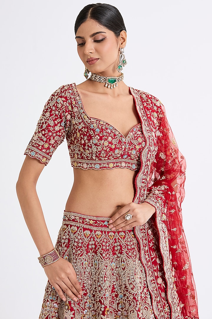Red Raw Silk Zari Hand & Machine Embroidered Bridal Lehenga Set by Kalighata at Pernia's Pop Up Shop