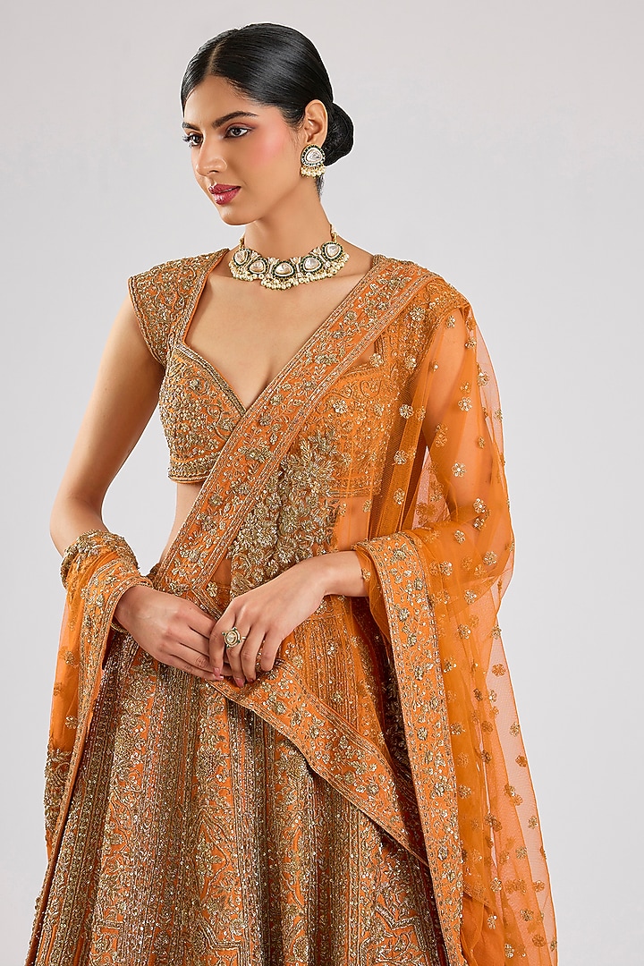 Rust Raw Silk Embroidered Bridal Lehenga Set by Kalighata at Pernia's Pop Up Shop