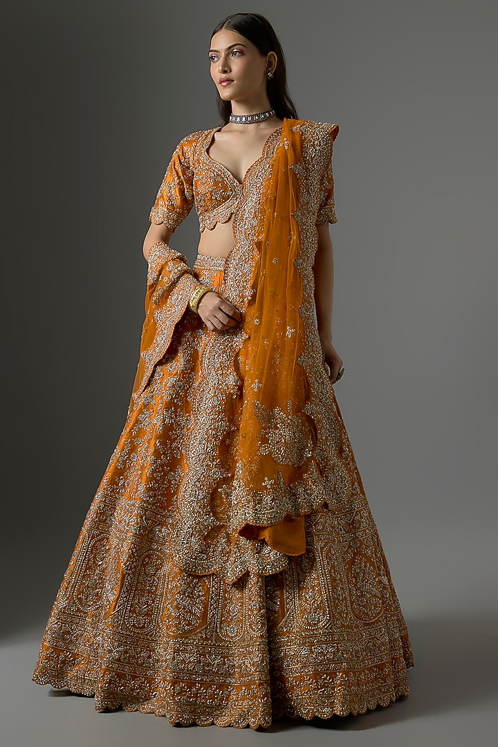 Rust Raw Silk Zari Hand & Machine Embroidered Bridal Lehenga Set by Kalighata at Pernia's Pop Up Shop