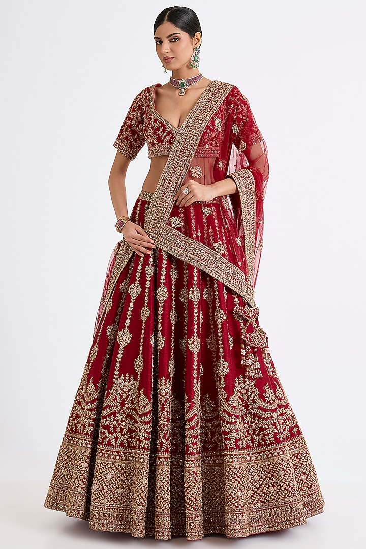 Maroon Raw Silk Zari Hand & Machine Embroidered Bridal Lehenga Set by Kalighata at Pernia's Pop Up Shop