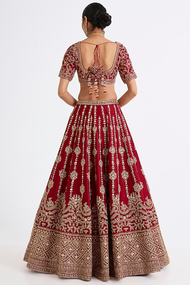 Maroon Raw Silk Zari Hand & Machine Embroidered Bridal Lehenga Set by Kalighata at Pernia's Pop Up Shop