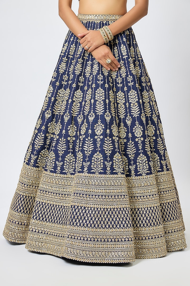 Navy Blue Raw Silk Cutdana Hand & Machine Embroidered Bridal Lehenga Set by Kalighata at Pernia's Pop Up Shop