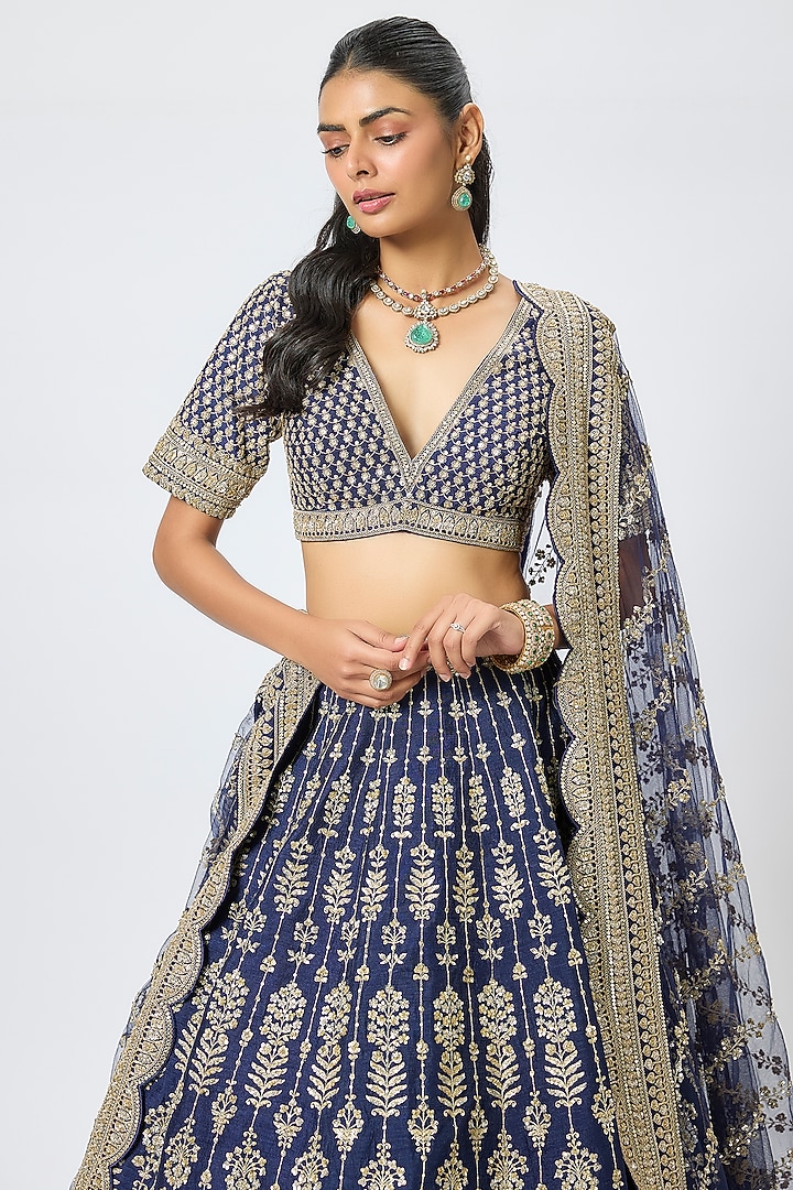 Navy Blue Raw Silk Cutdana Hand & Machine Embroidered Bridal Lehenga Set by Kalighata at Pernia's Pop Up Shop