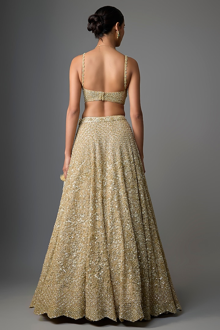 Gold Net Embroidered Bridal Lehenga Set by Kalighata at Pernia's Pop Up Shop