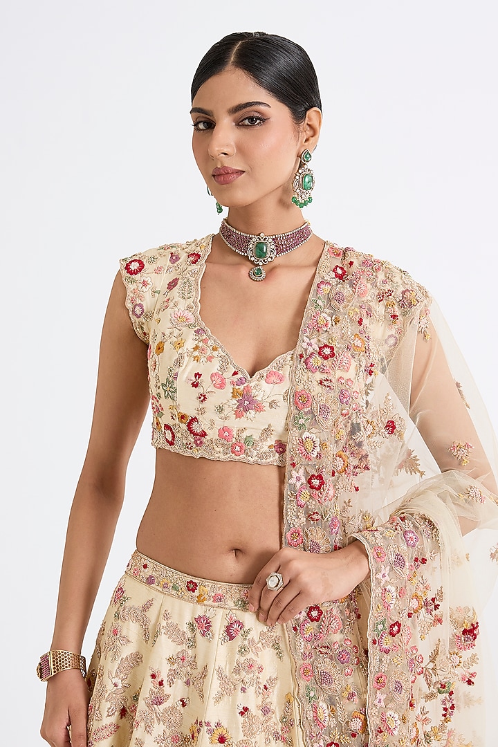 Ivory Raw Silk Zari Hand & Machine Embroidered Bridal Lehenga Set by Kalighata at Pernia's Pop Up Shop