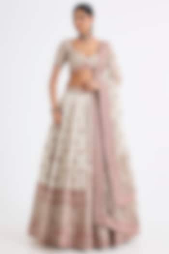 Ivory Raw Silk Zari Hand & Machine Embroidered Bridal Lehenga Set by Kalighata at Pernia's Pop Up Shop
