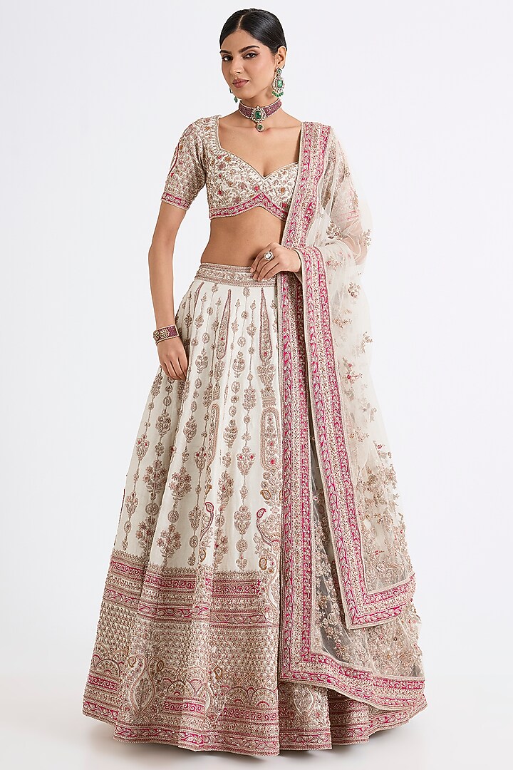 Ivory Raw Silk Zari Hand & Machine Embroidered Bridal Lehenga Set by Kalighata at Pernia's Pop Up Shop