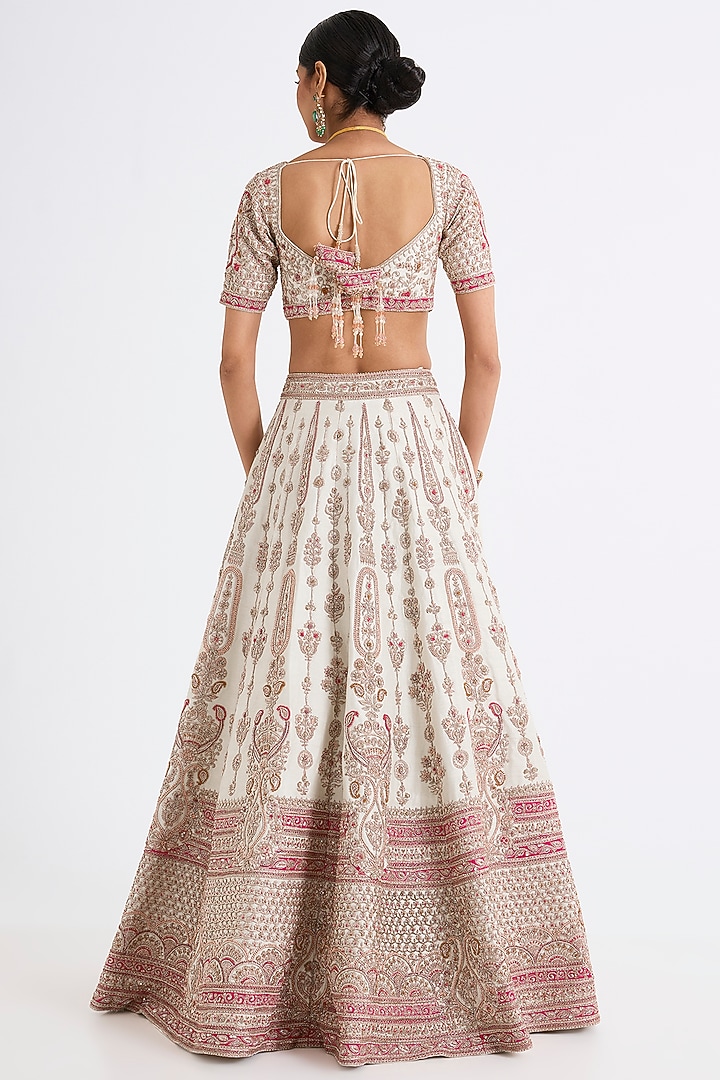 Ivory Raw Silk Zari Hand & Machine Embroidered Bridal Lehenga Set by Kalighata at Pernia's Pop Up Shop