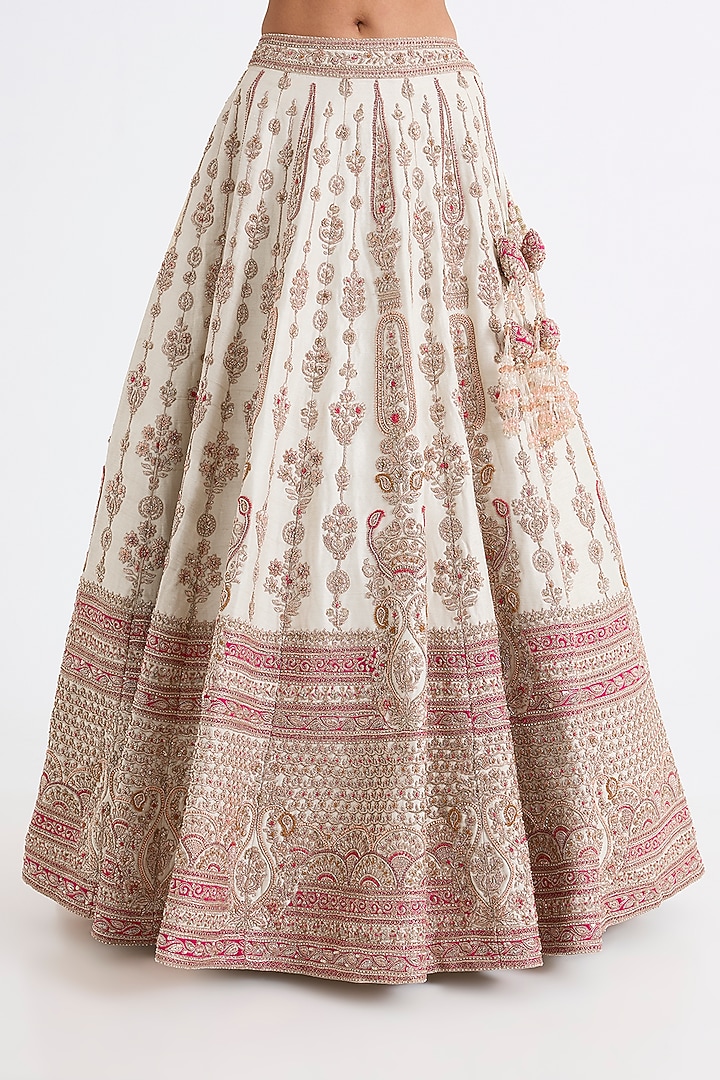 Ivory Raw Silk Zari Hand & Machine Embroidered Bridal Lehenga Set by Kalighata at Pernia's Pop Up Shop