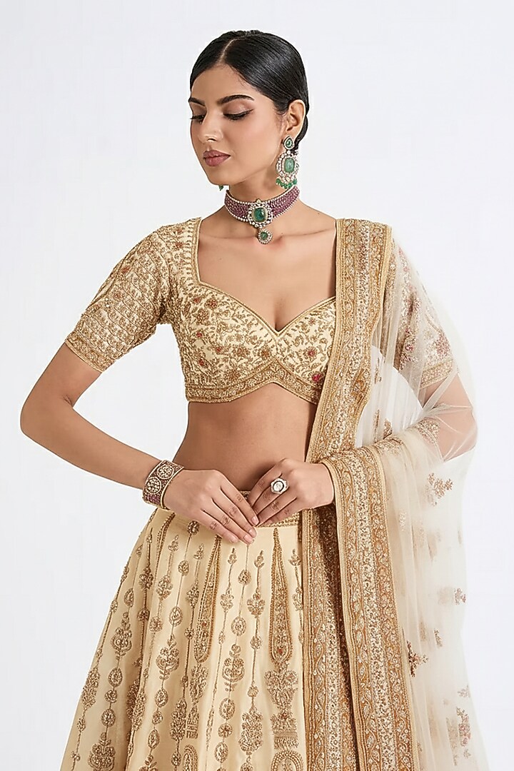 Ivory Raw Silk Hand & Machine Embroidered Bridal Lehenga Set by Kalighata at Pernia's Pop Up Shop