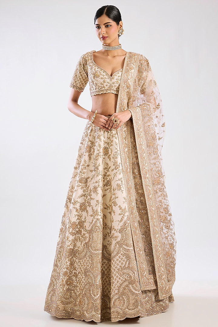 Peach Raw Silk Zari Hand & Machine Embroidered Bridal Lehenga Set by Kalighata at Pernia's Pop Up Shop