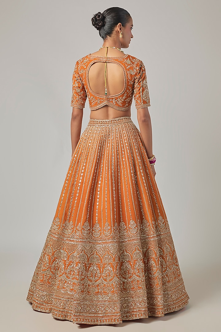 Rust Raw Silk Embroidered Bridal Lehenga Set by Kalighata at Pernia's Pop Up Shop