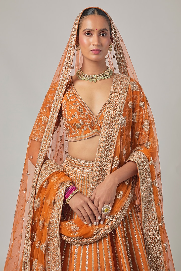 Rust Raw Silk Embroidered Bridal Lehenga Set by Kalighata at Pernia's Pop Up Shop