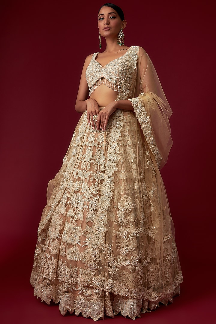 Peach Net Hand Embroidered Bridal Lehenga Set by Kalighata at Pernia's Pop Up Shop