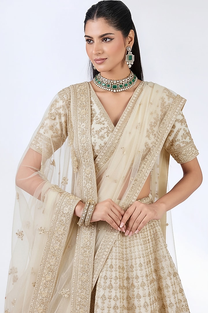 Ivory Raw Silk Zardosi Embellished Bridal Lehenga Set by Kalighata at Pernia's Pop Up Shop