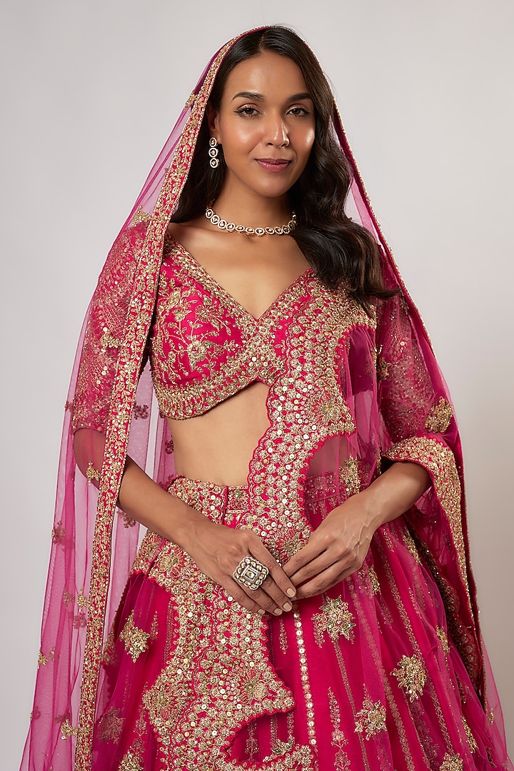 Rani Pink Raw Silk Hand & Machine Embroidered Bridal Lehenga Set by Kalighata at Pernia's Pop Up Shop
