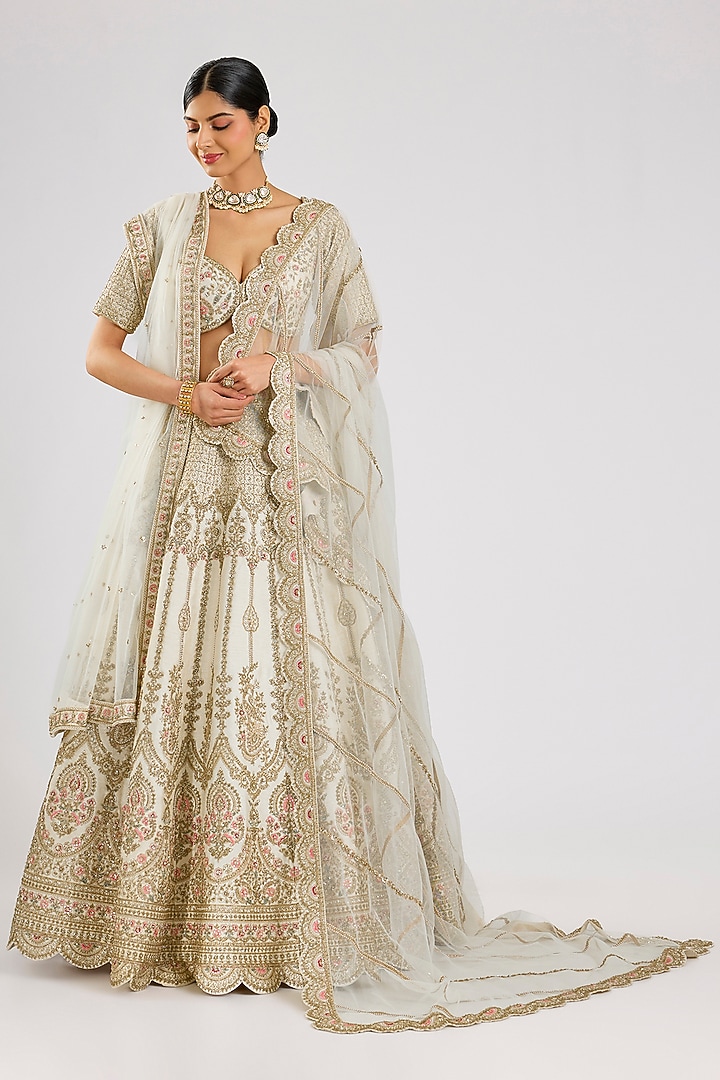 Ivory Raw Silk Embroidered Bridal Lehenga Set by Kalighata at Pernia's Pop Up Shop