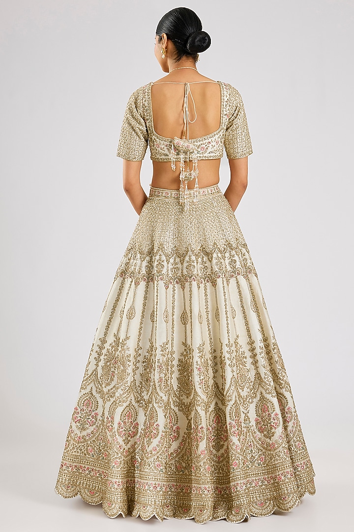 Ivory Raw Silk Embroidered Bridal Lehenga Set by Kalighata at Pernia's Pop Up Shop
